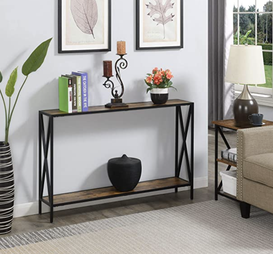 The wooden brown and black console table