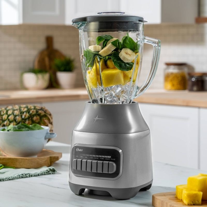 The blender with fruits inside