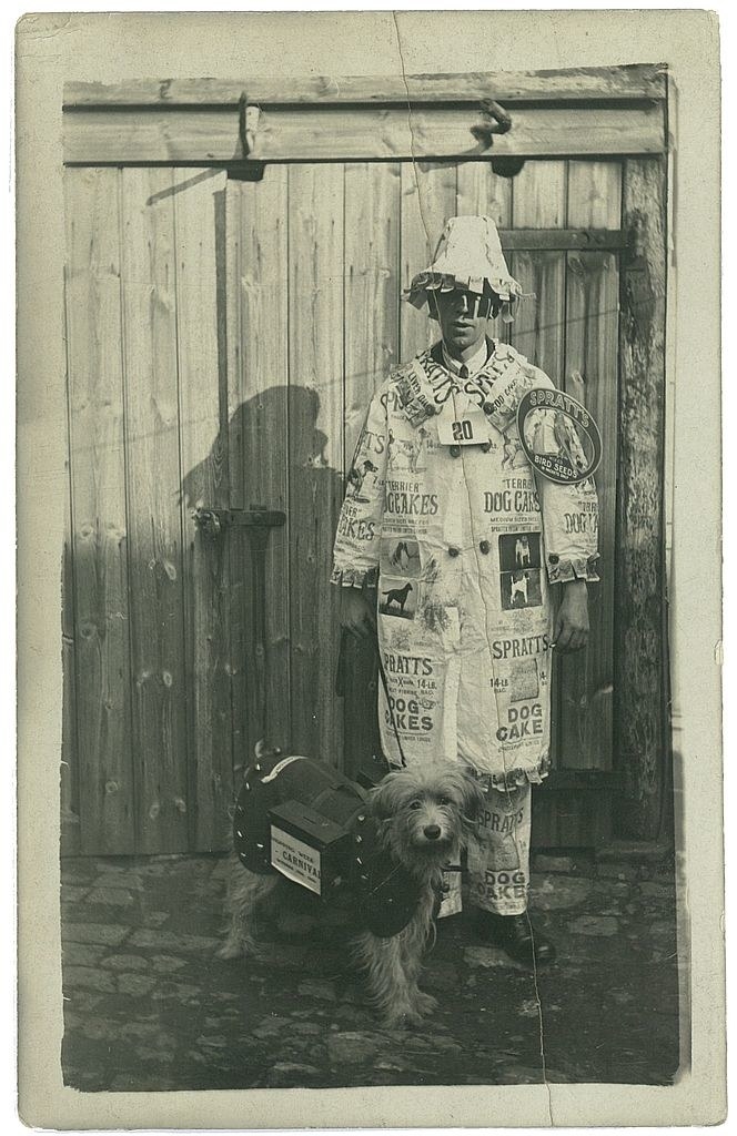 A man and his dog in costume