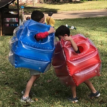Reviewer's two children playing in the bumpers