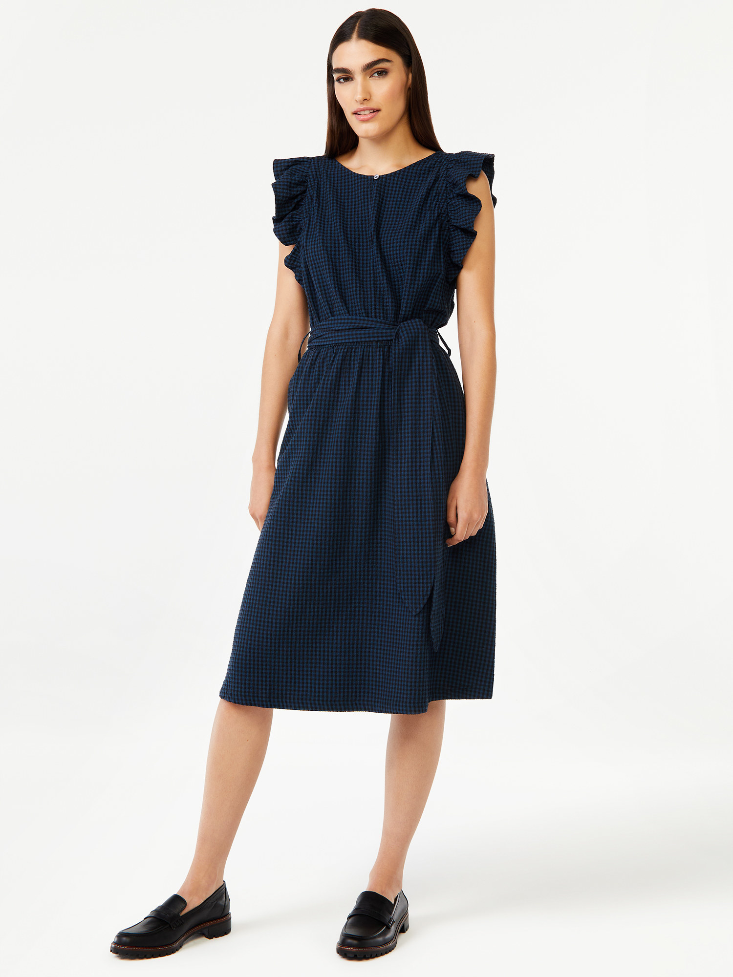 model wearing the dress in blue gingham