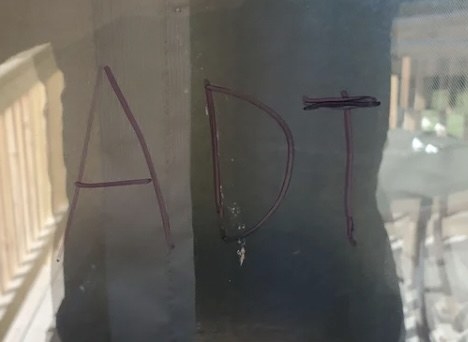ADT on a glass window