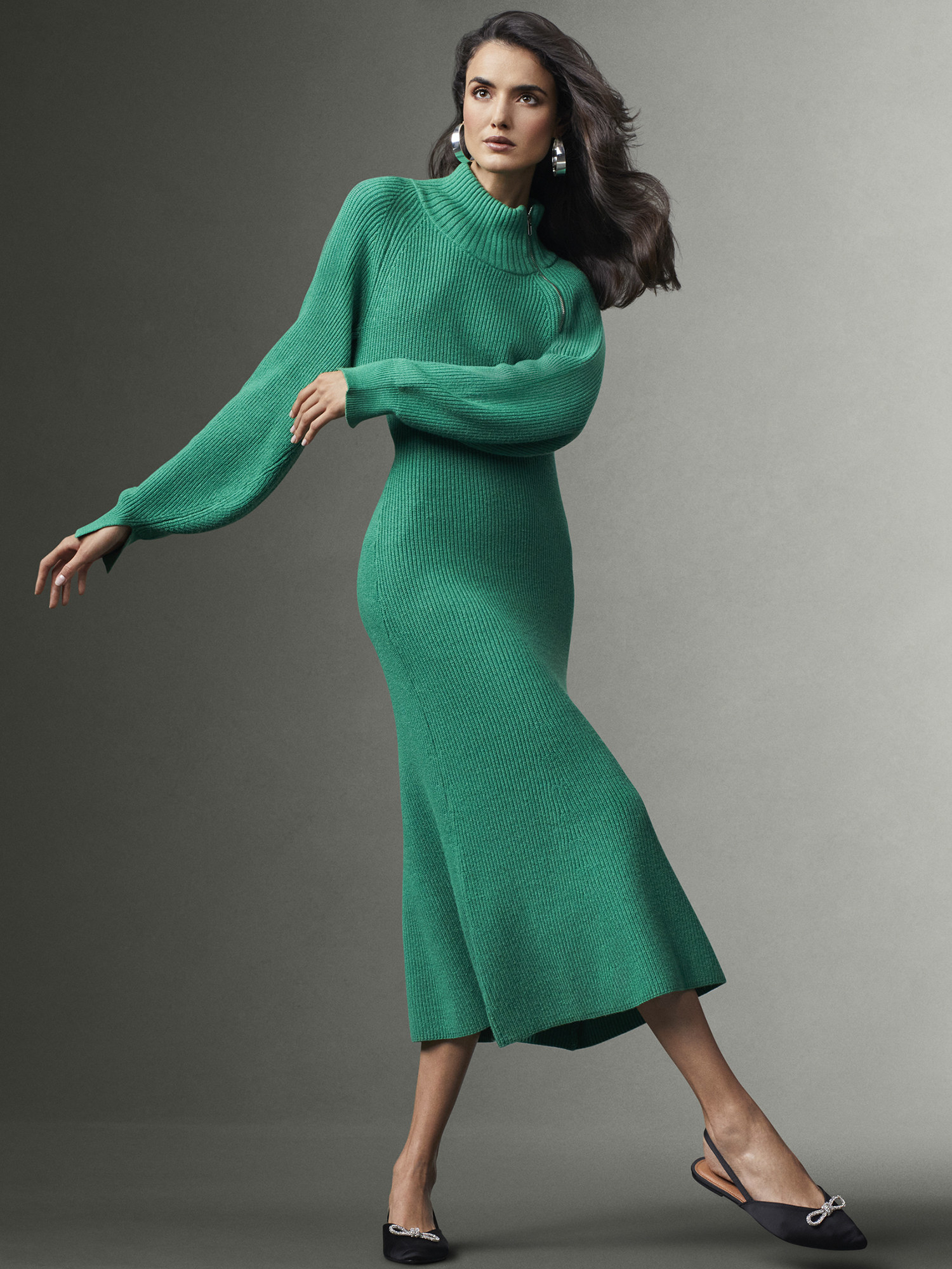 model wearing the dress in green