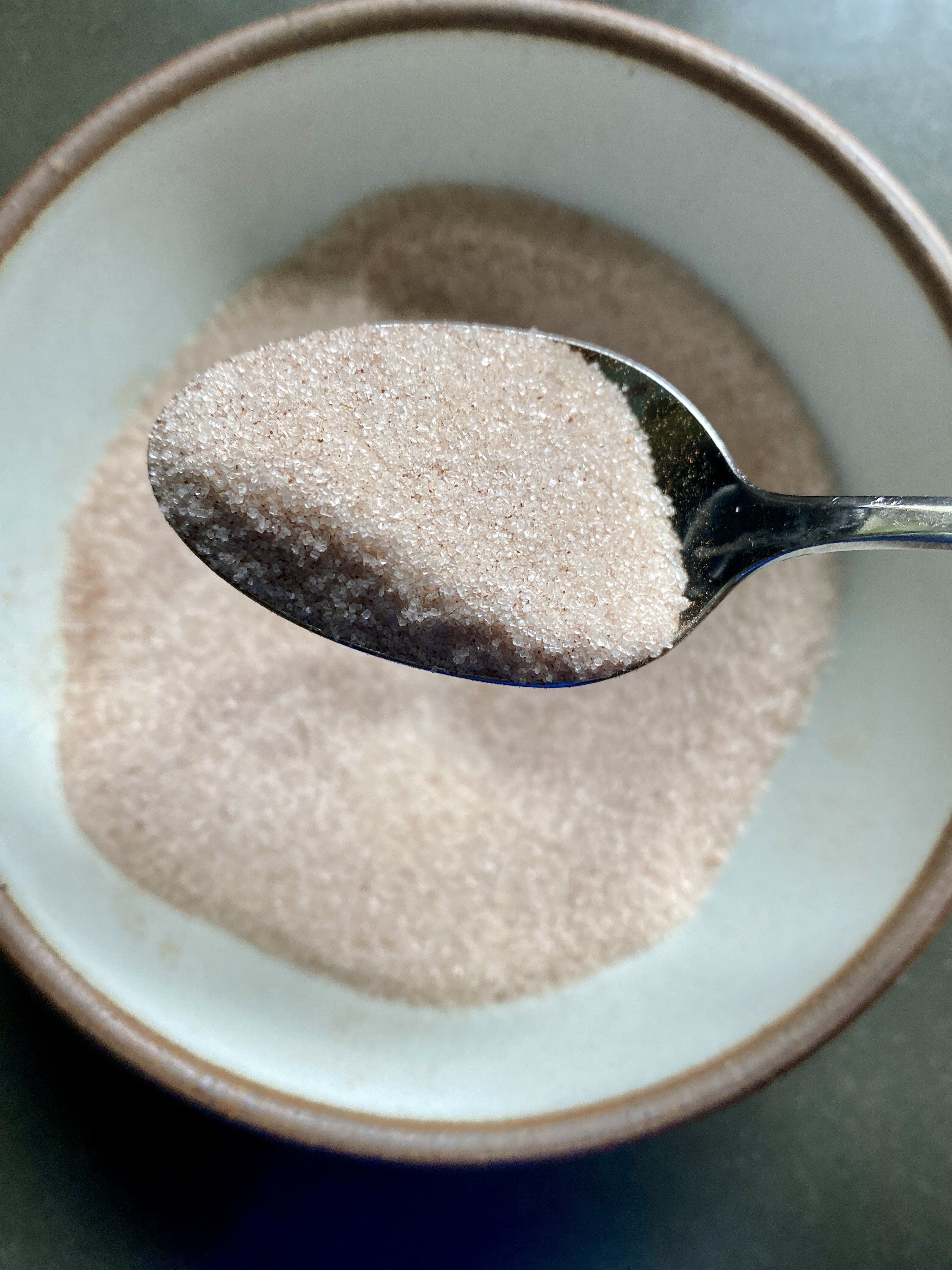 Pumpkin spice sugar in bowl with spoon