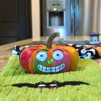 reviewer's photo of a pumpkin painted with the paint sticks