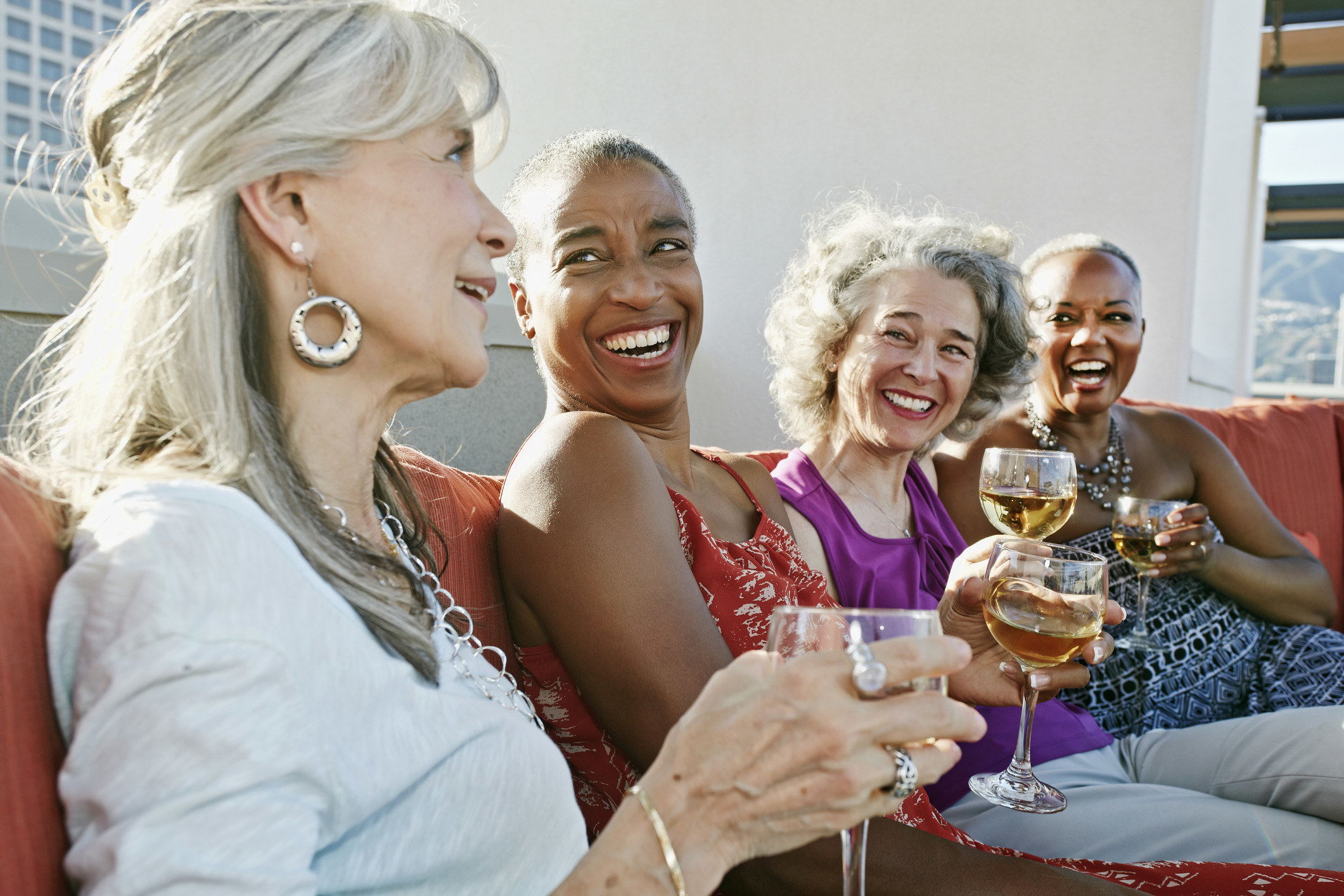 A group of women drinking wine together