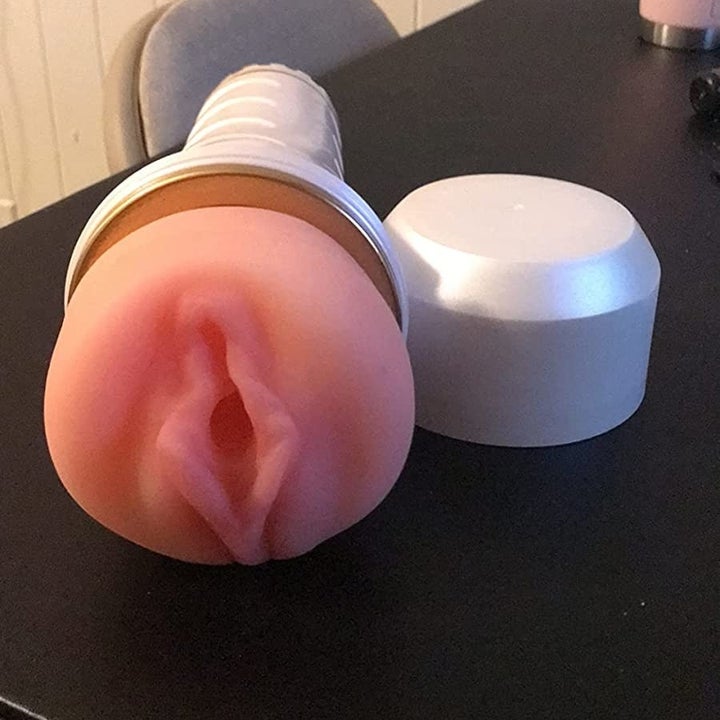 Realistic masturbator with white case