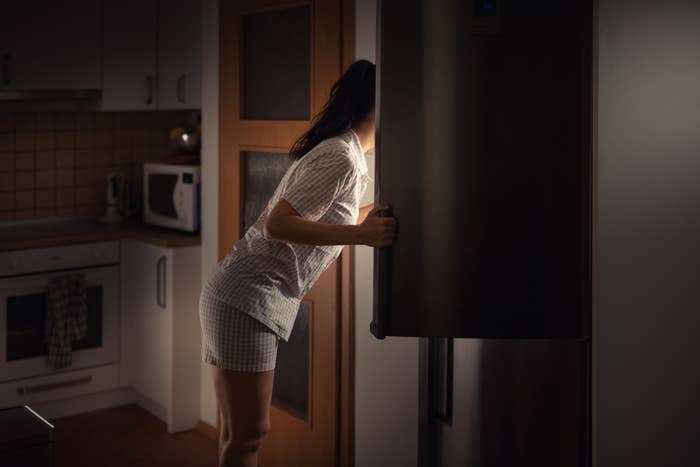 Person looking in a fridge