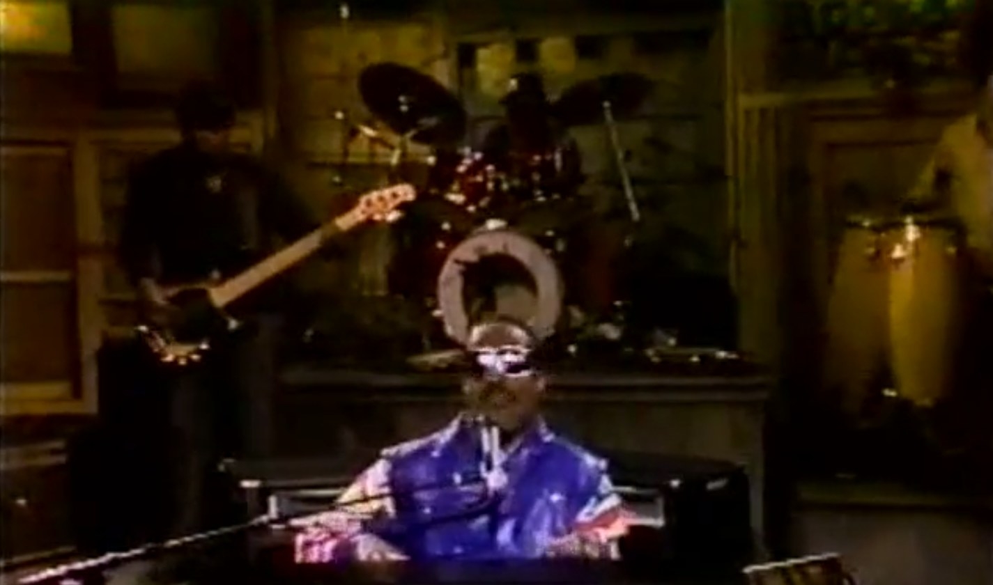 Stevie Wonder playing onstage at SNL