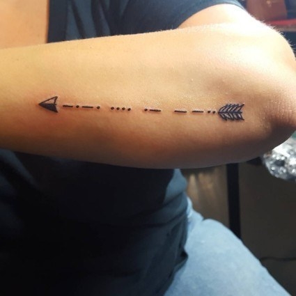Morse code tattoo on arm