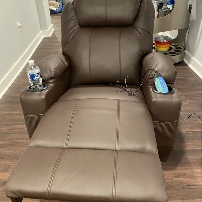 A brown heated massage chair
