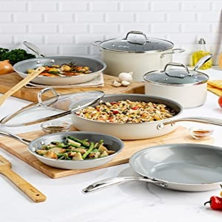 the ceramic cookware set being used in the kitchen