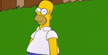 Homer Simpson walking backwards into a bush