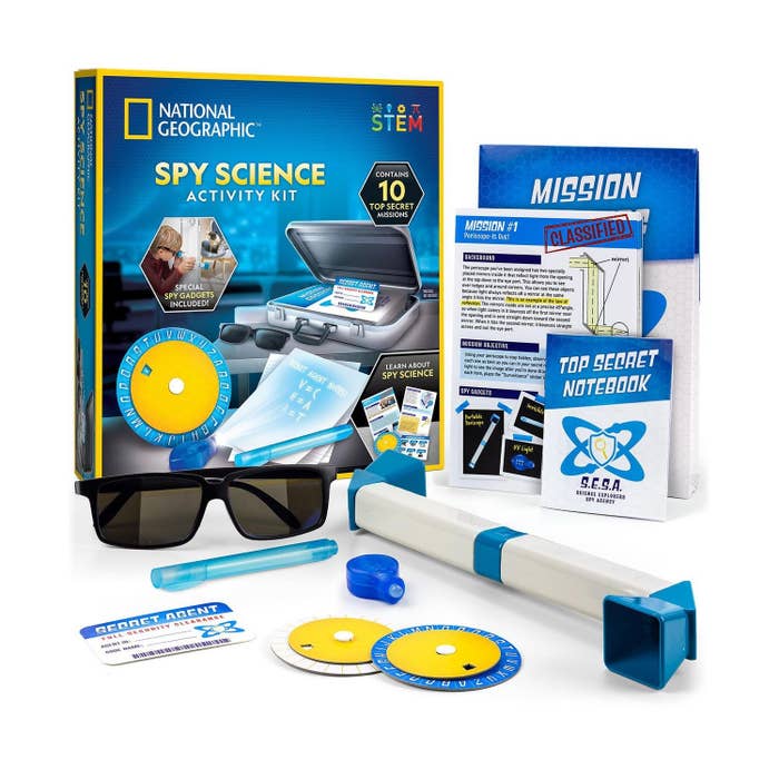 spy kit that includes sunglasses, invisible pen, and a few decoders