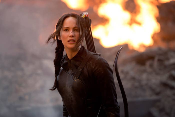 Jennifer in the movie standing in front of fire