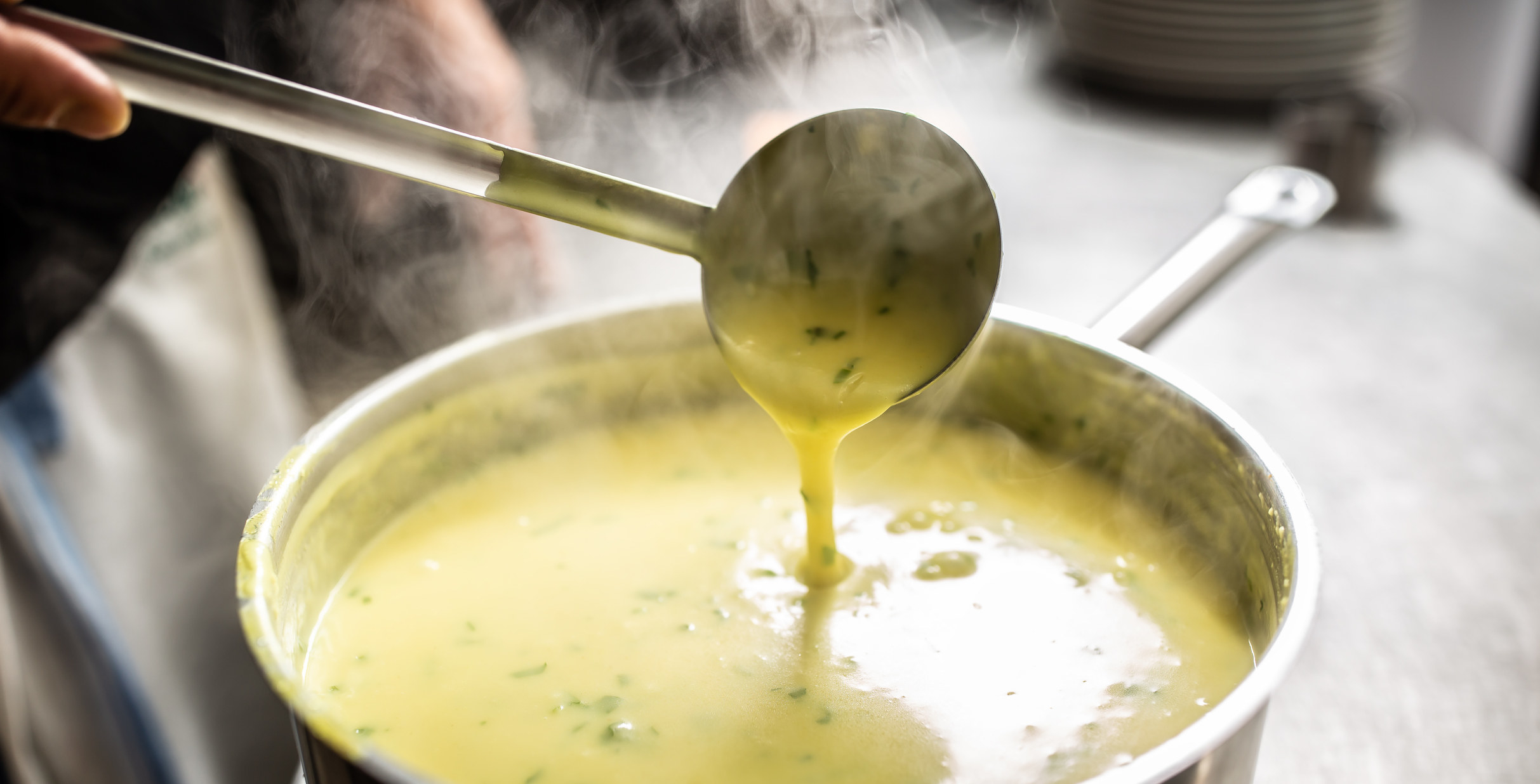 A pot of cream of vegetable soup