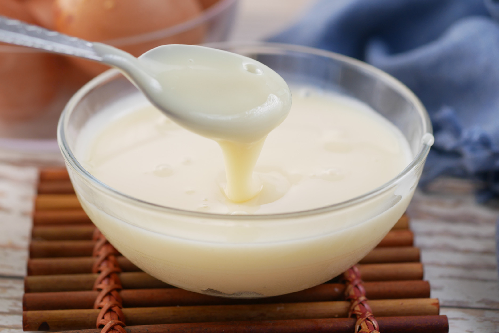 Condensed milk in a bowl closeup