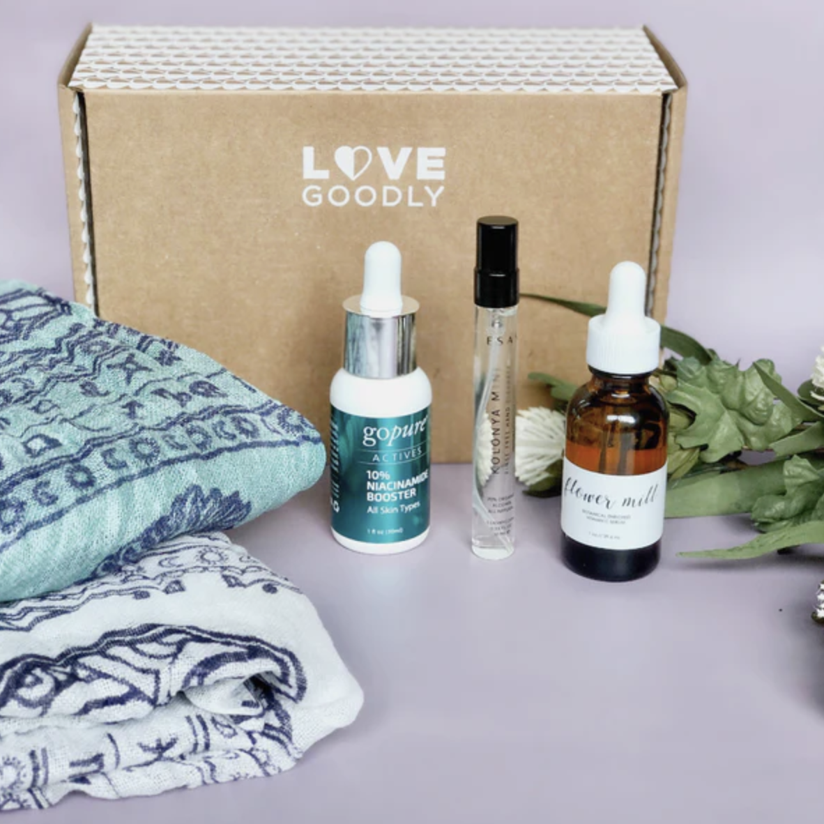 A variety of products next to a Love Goodly box