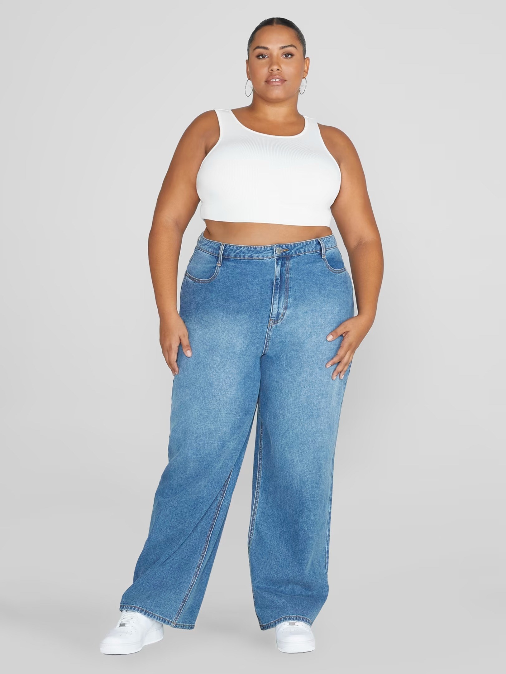 model wearing wide-leg jeans
