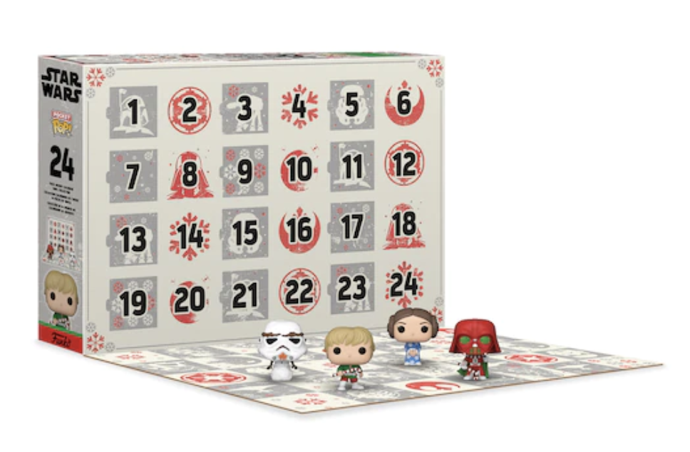 the advent calendar folded open with the figurines in front