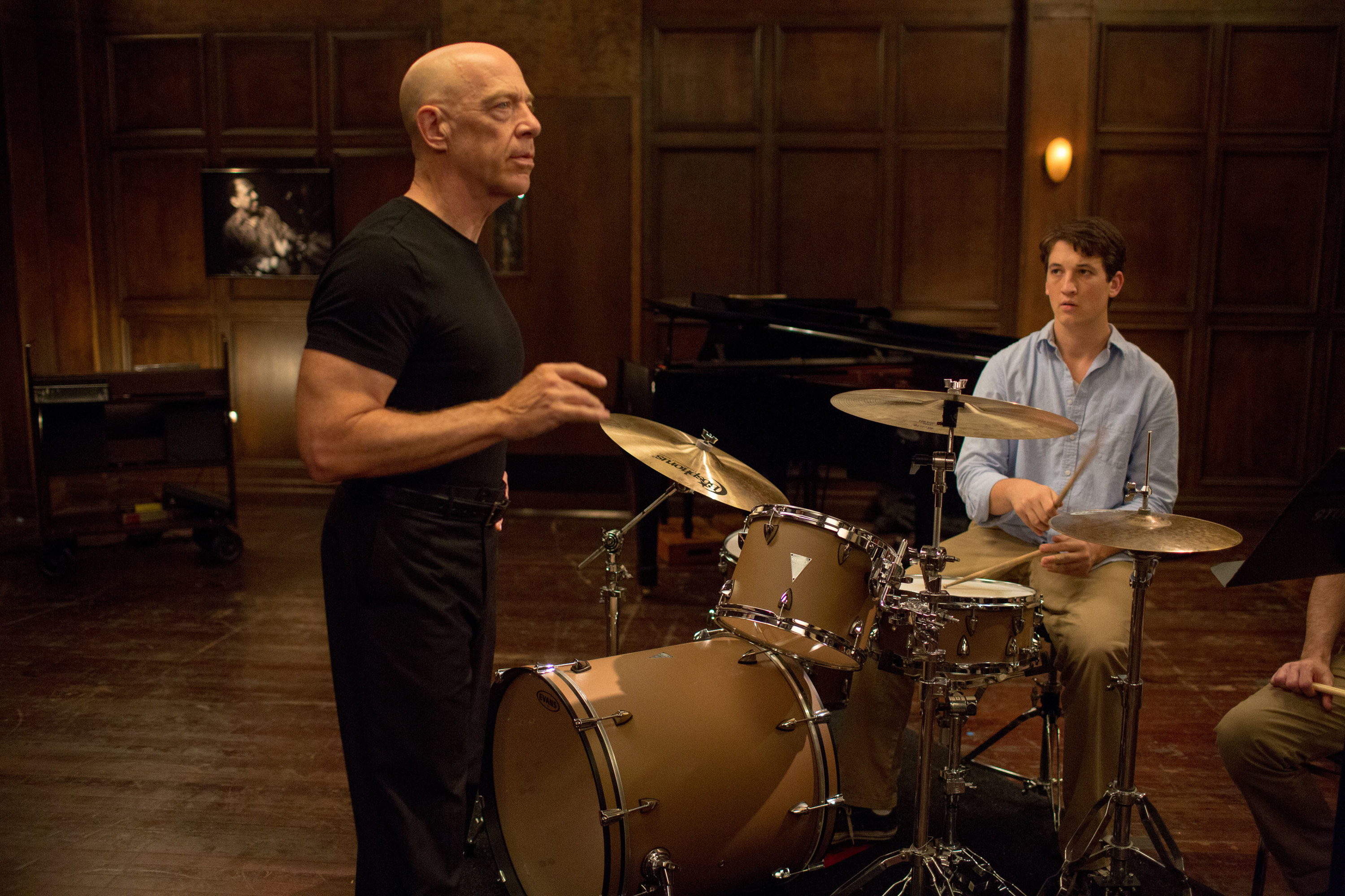 J.K. Simmons conducting while Miles Teller drums.