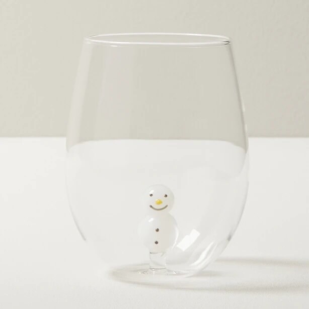 the wine glass on a plain surface