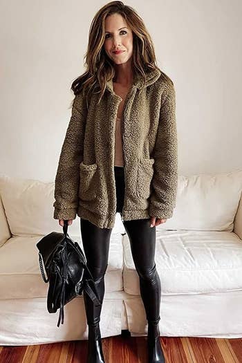model wearing the zipper fleece jacket in coffee color