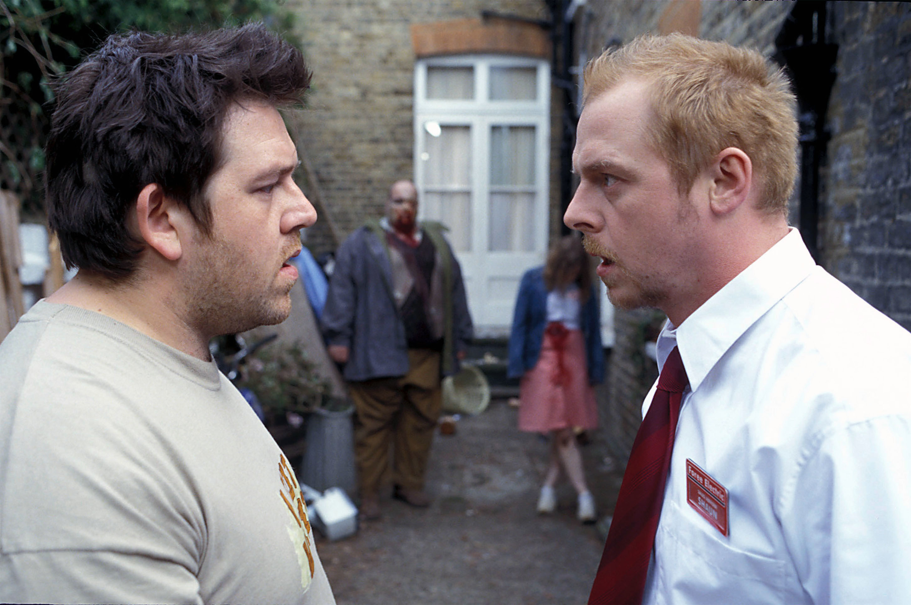 Nick Frost and Simon Pegg staring at each other.