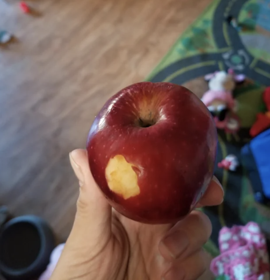 one small bite in an apple