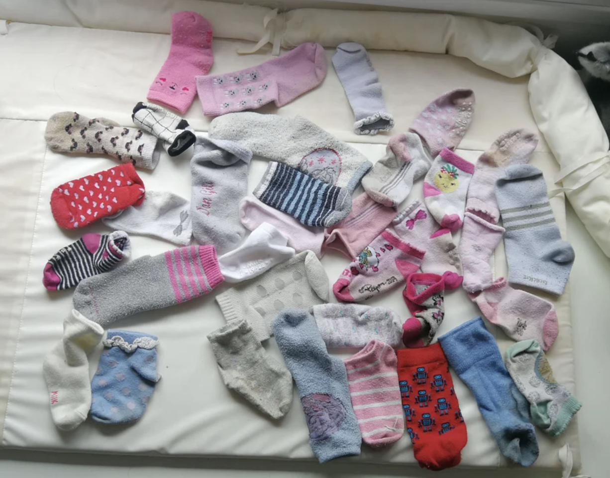 socks laid out on a bed