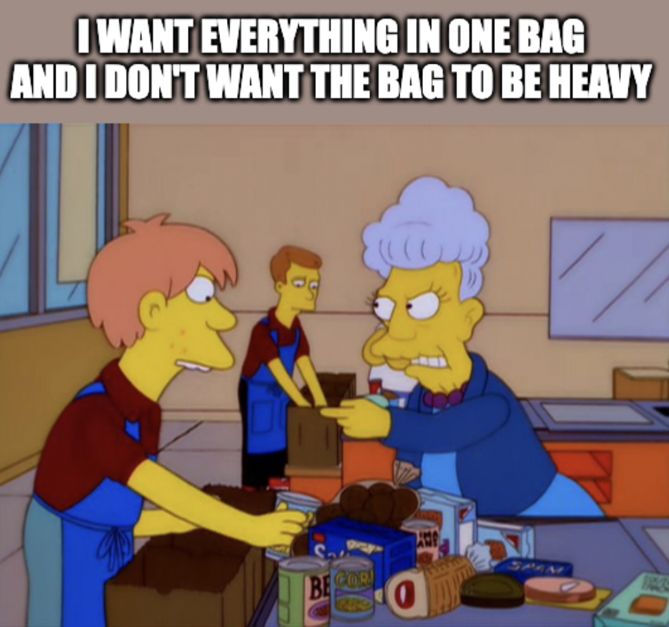 Simpsons supermarket scene with caption, &quot;I want everything in one bag and I don&#x27;t want it to be heavy&quot;