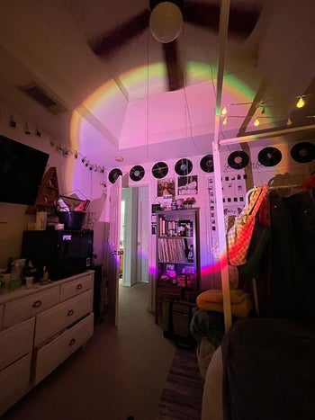 another reviewer's room with purple colorful lights reflecting