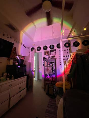 another reviewer's room with purple colorful lights reflecting