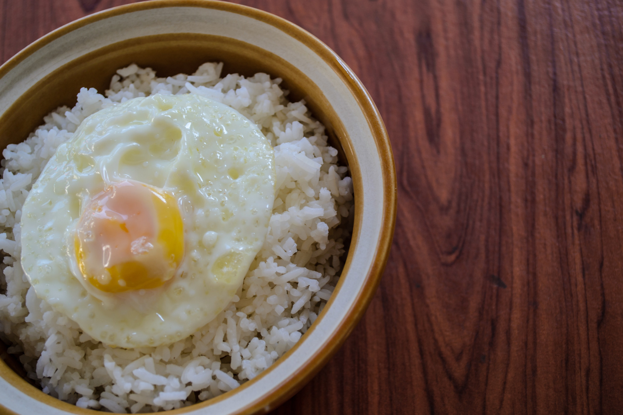 Fried egg on a bowl of rice