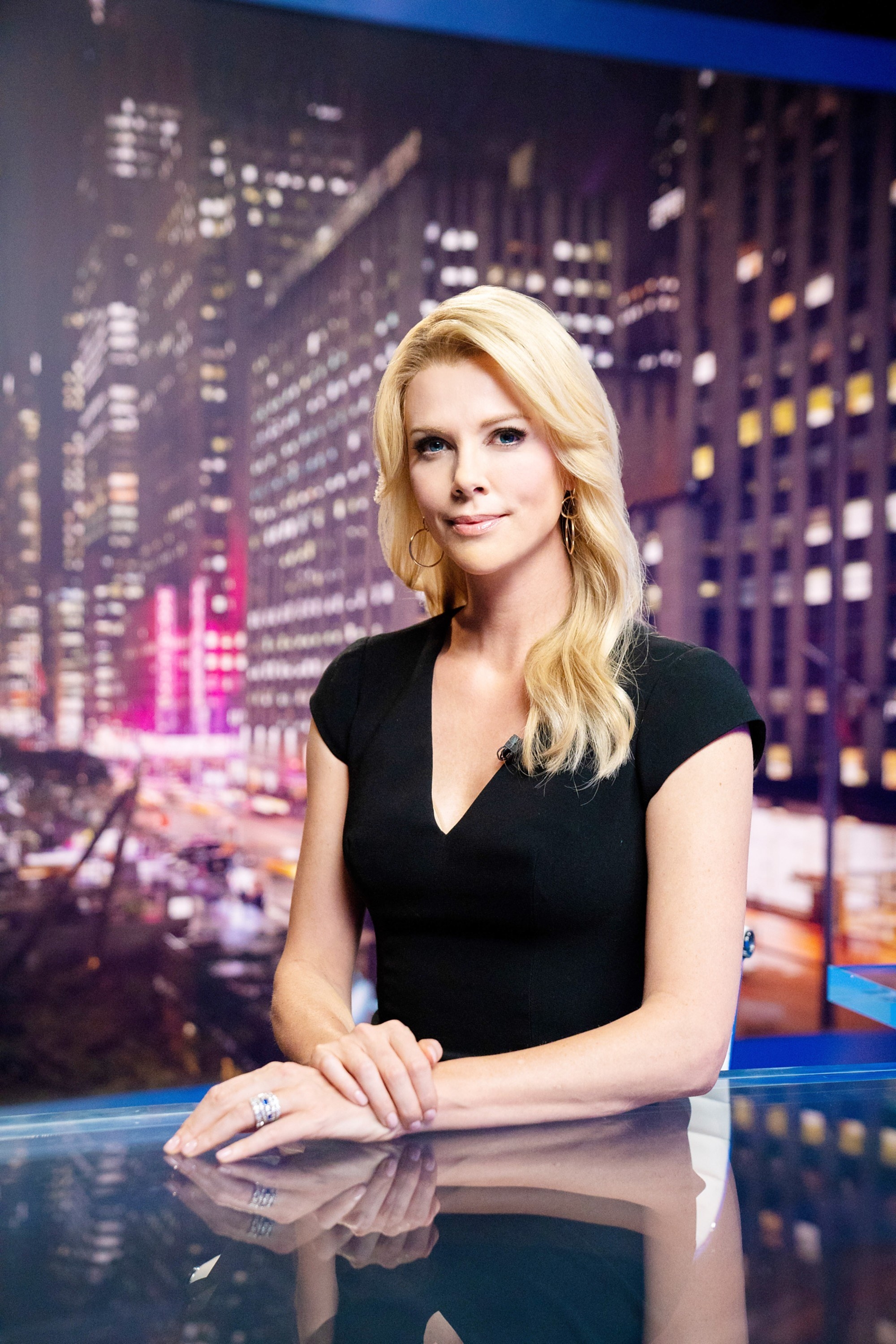 Charlize transformed into the anchorwoman