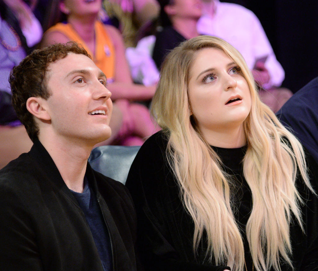 Daryl Sabara and Meghan Trainor attend a basketball game between Los Angeles Clippers and Los Angeles Lakers