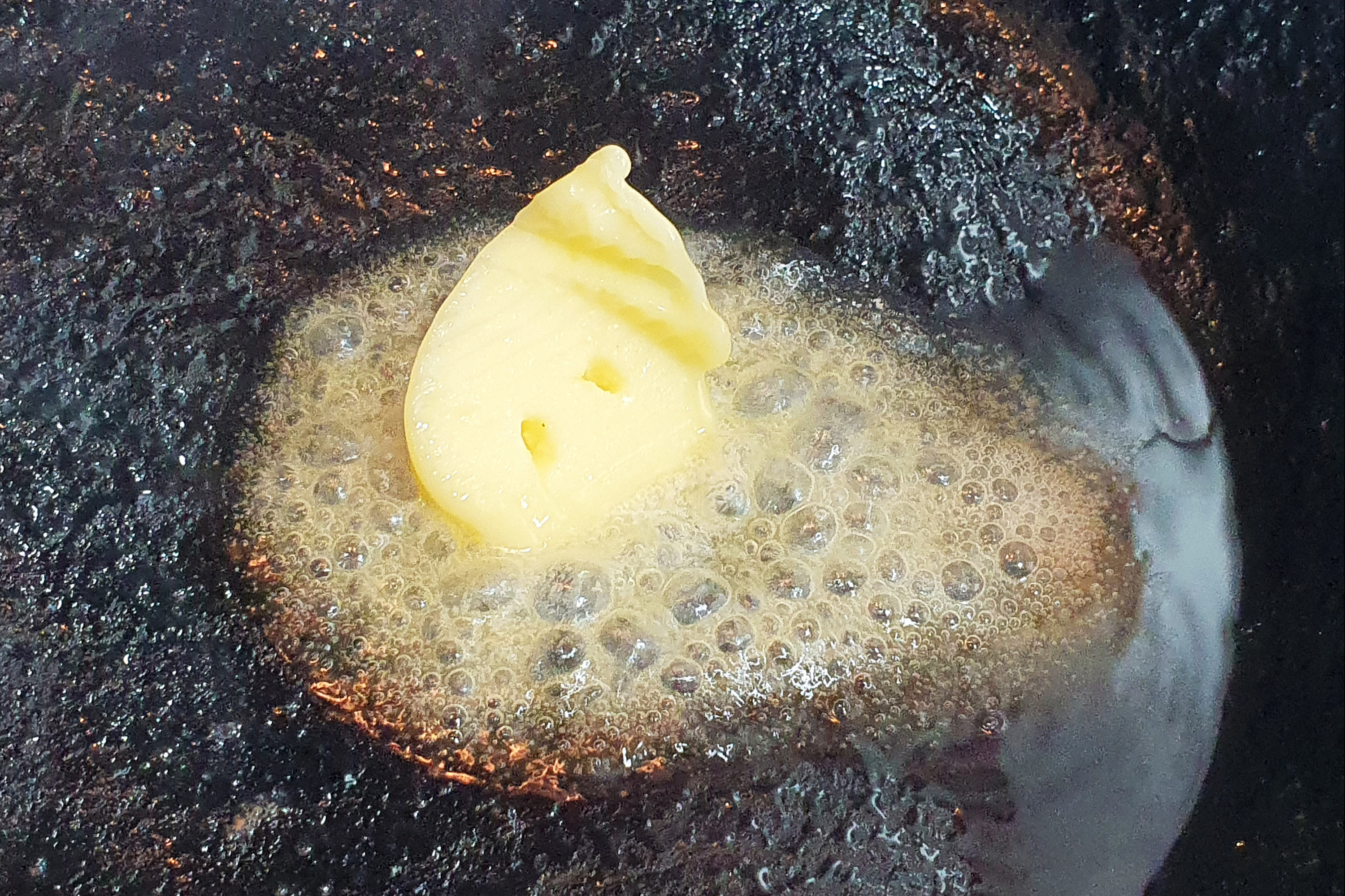 butter melting in a pan