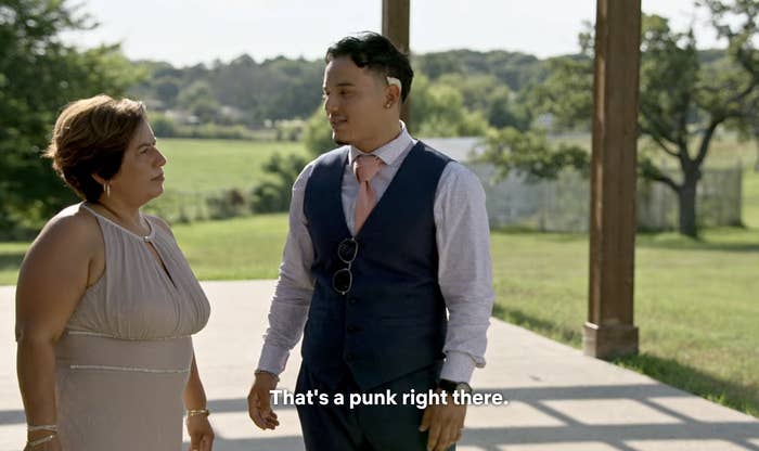 Erendira and Steve talking to each other outside Nancy&#x27;s wedding with the caption &quot;That&#x27;s a punk right there&quot;