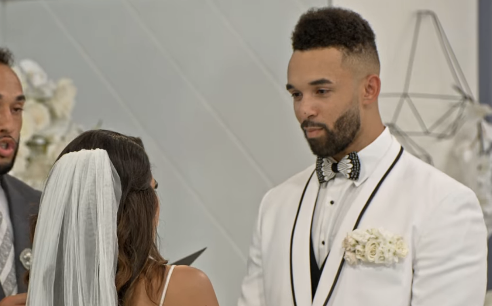 Bartise looking at Nancy during the wedding ceremony