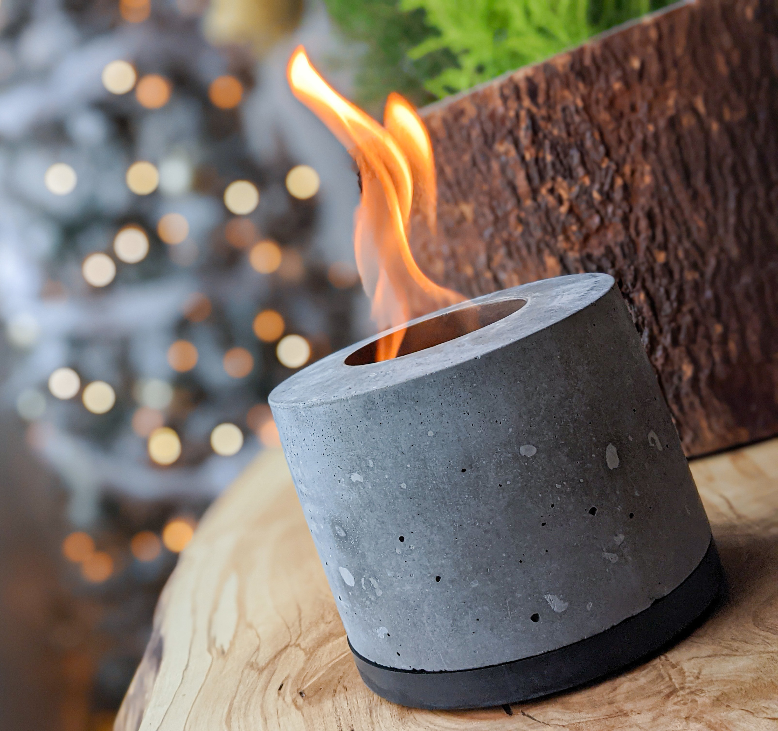 a close up of the concrete indoor fire pit on a tabletop