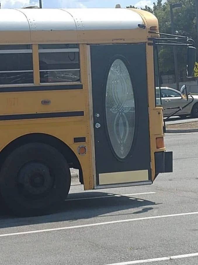 A regular door on a school bus