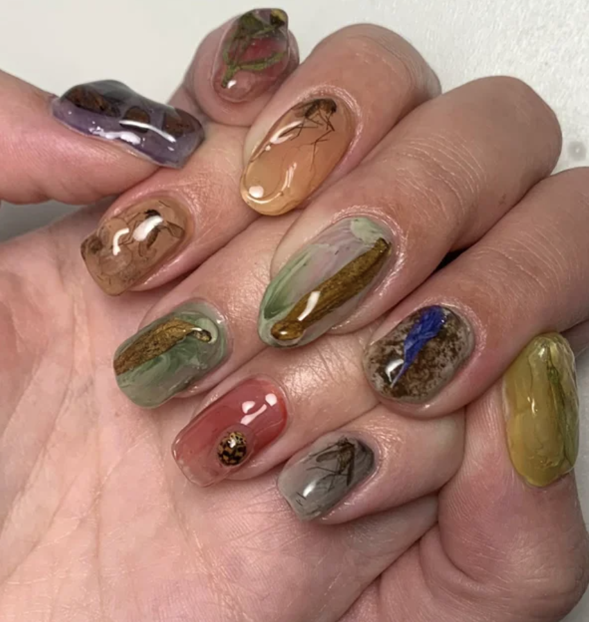 Nails with bugs on them