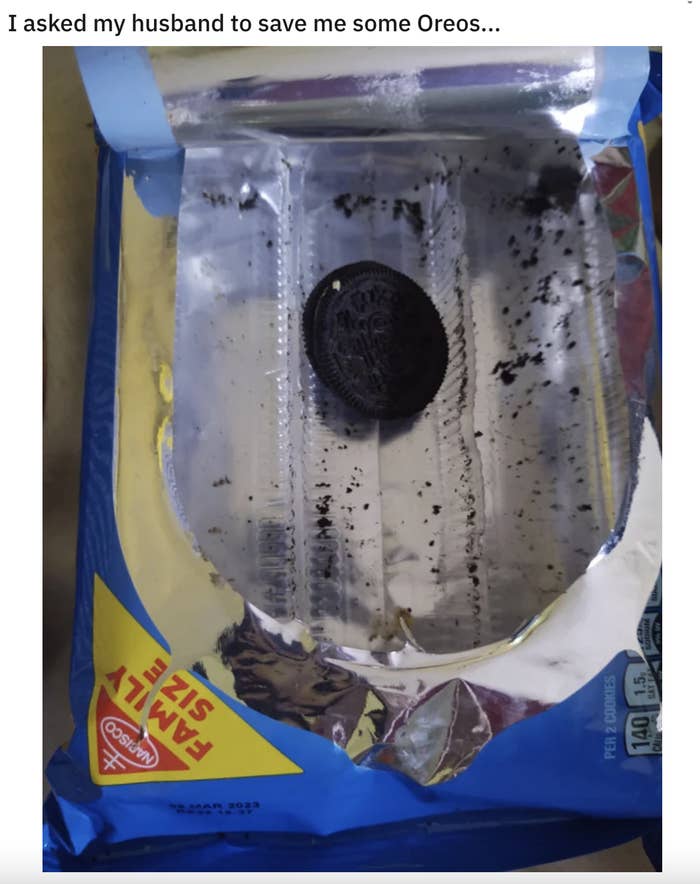 A carton of Oreos with just one Oreo left in it