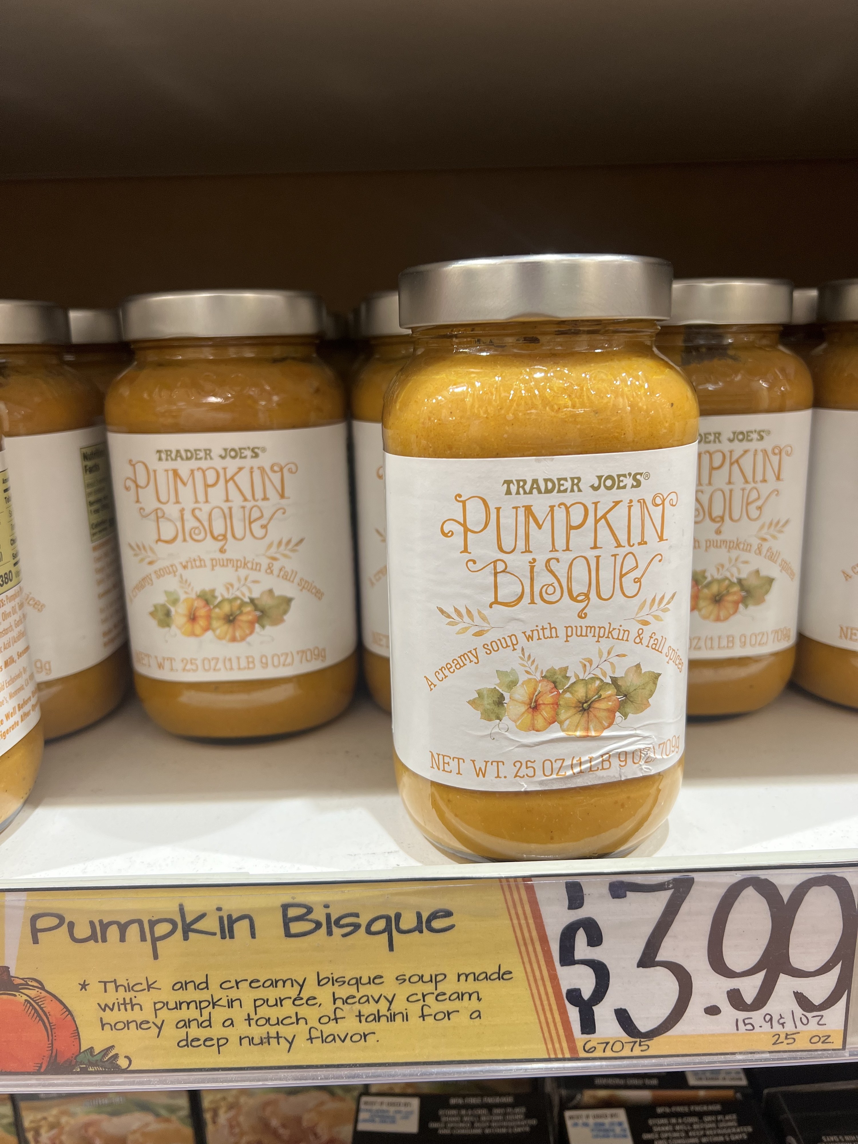 Jars of pumpkin bisque soup.