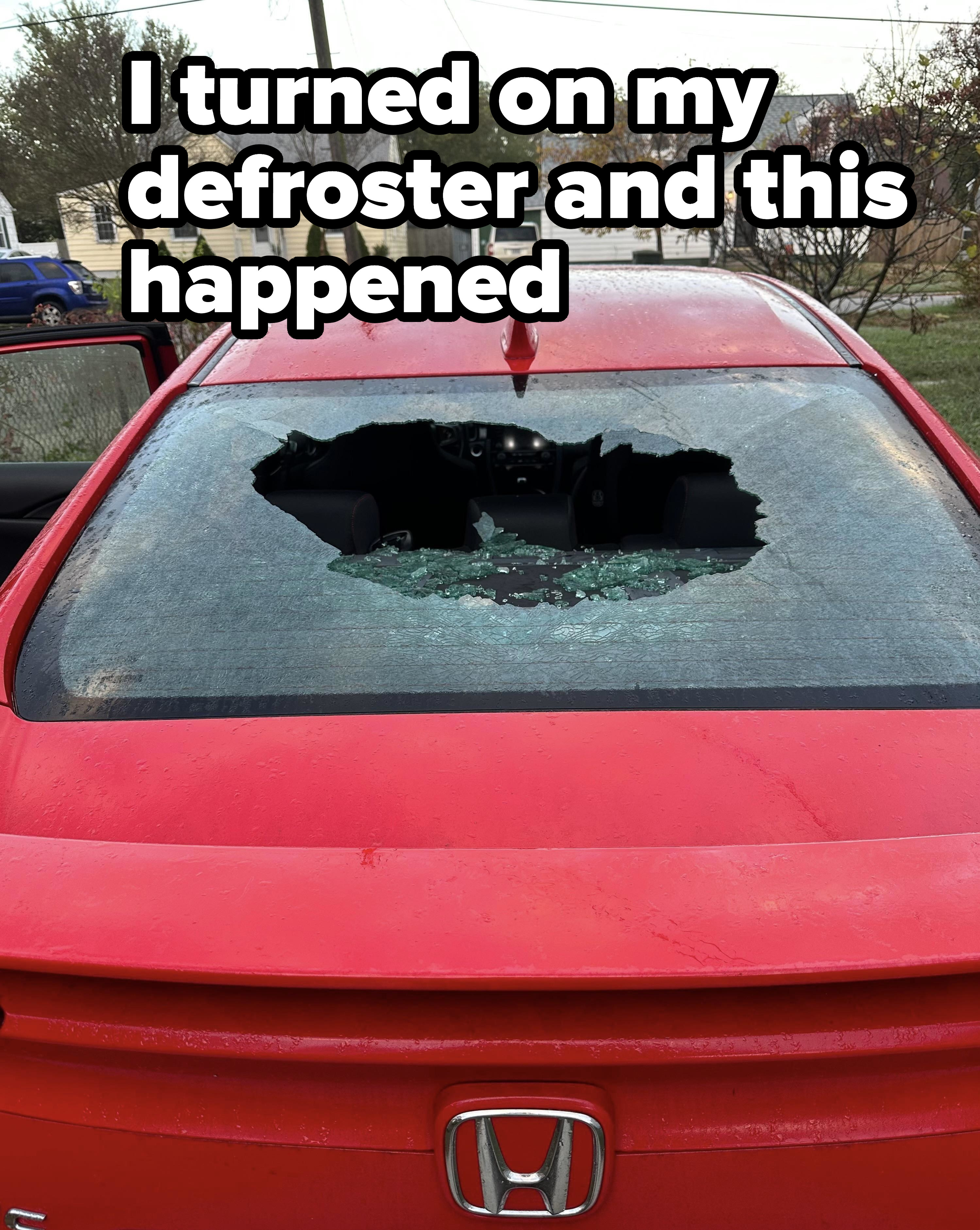 The shattered back window of a car