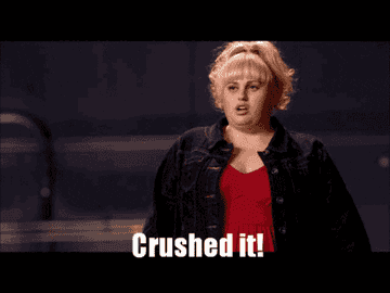 a gif of rebel wilson from bridesmaids saying crushed it