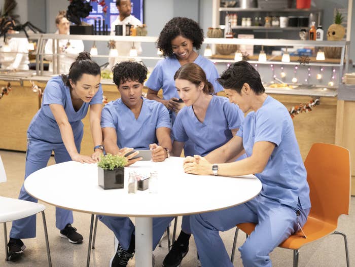 New interns sitting around a table