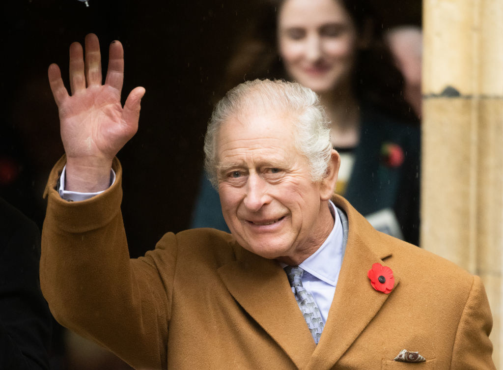 closeup of King Charles waving