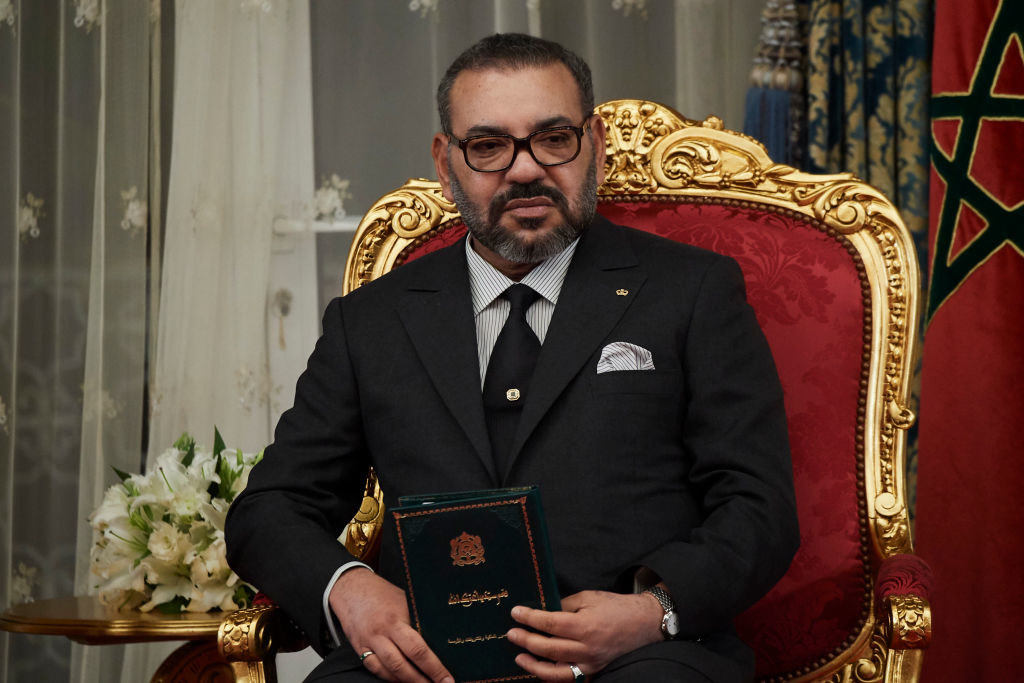 King Mohammed sitting on the throne