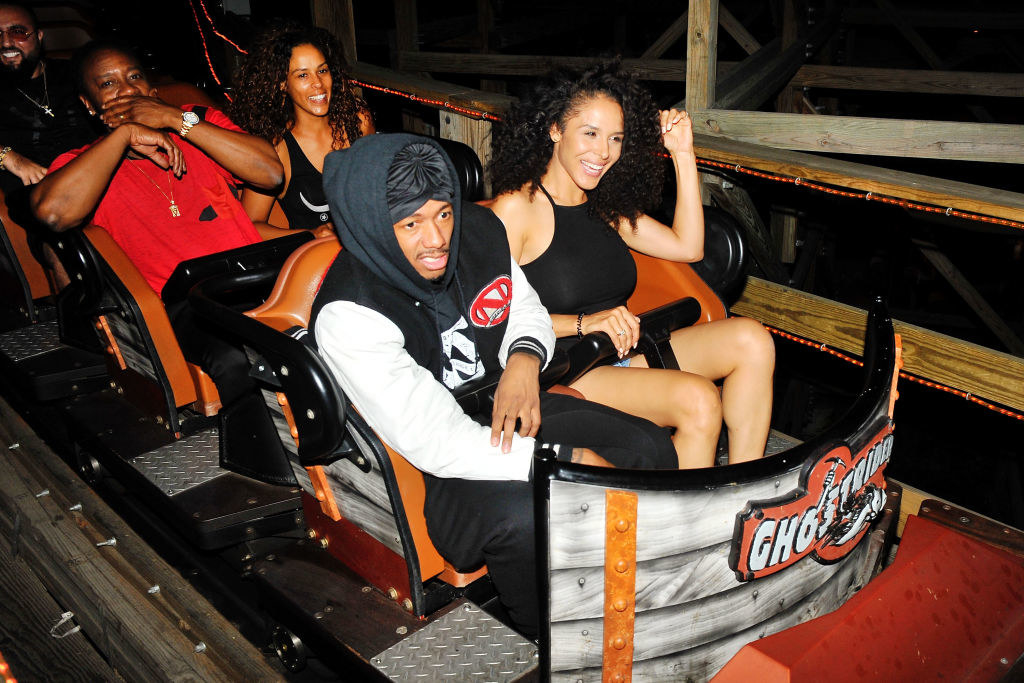 Nick and Brittany in the front seats of a roller coaster ride